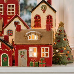 Hus til fyrfadslys · Christmas