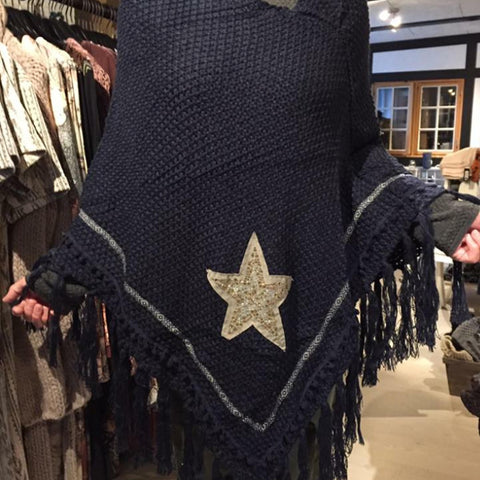 Poncho med stjerne
